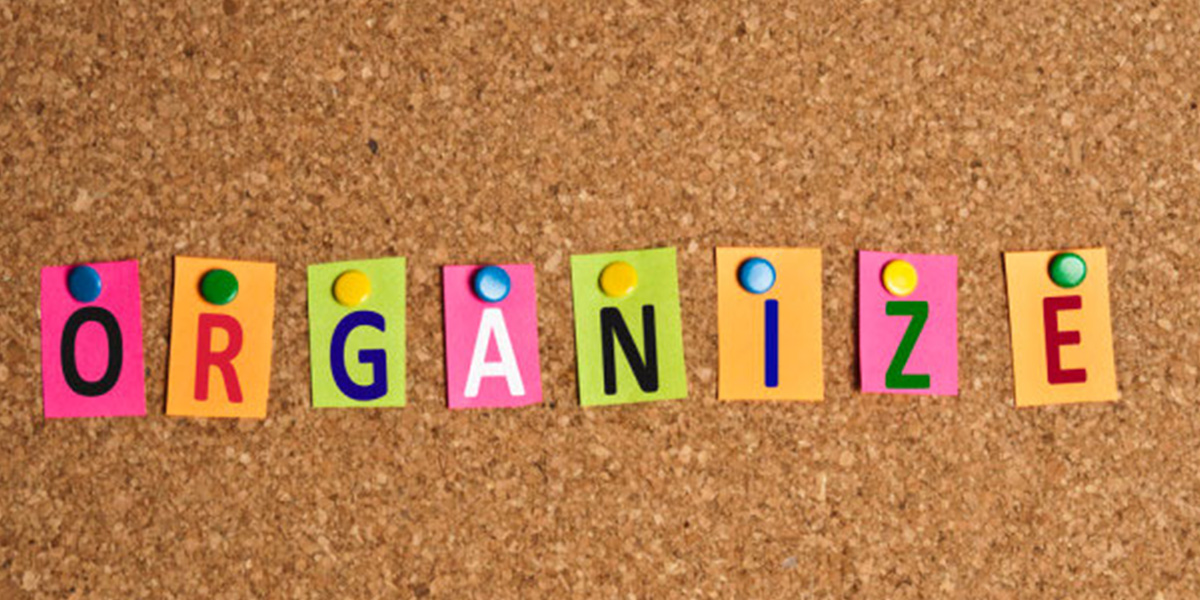 a bulletin board with the word organize pinned