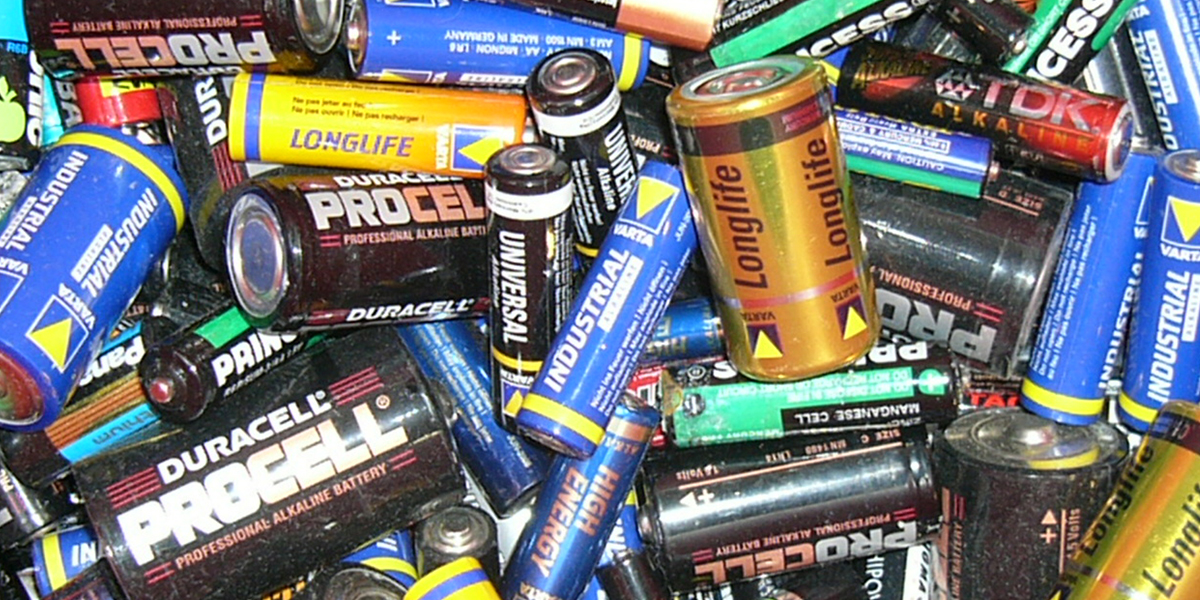 a messy pile of batteries