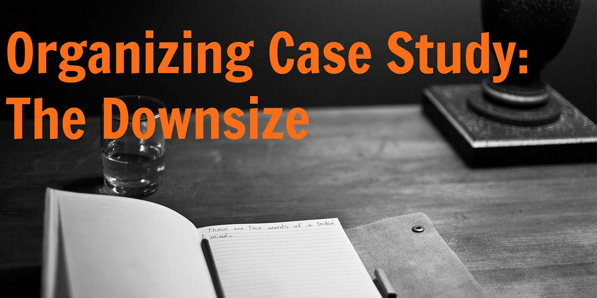 an open book on a table with text that reads, organizing case study: the downsize