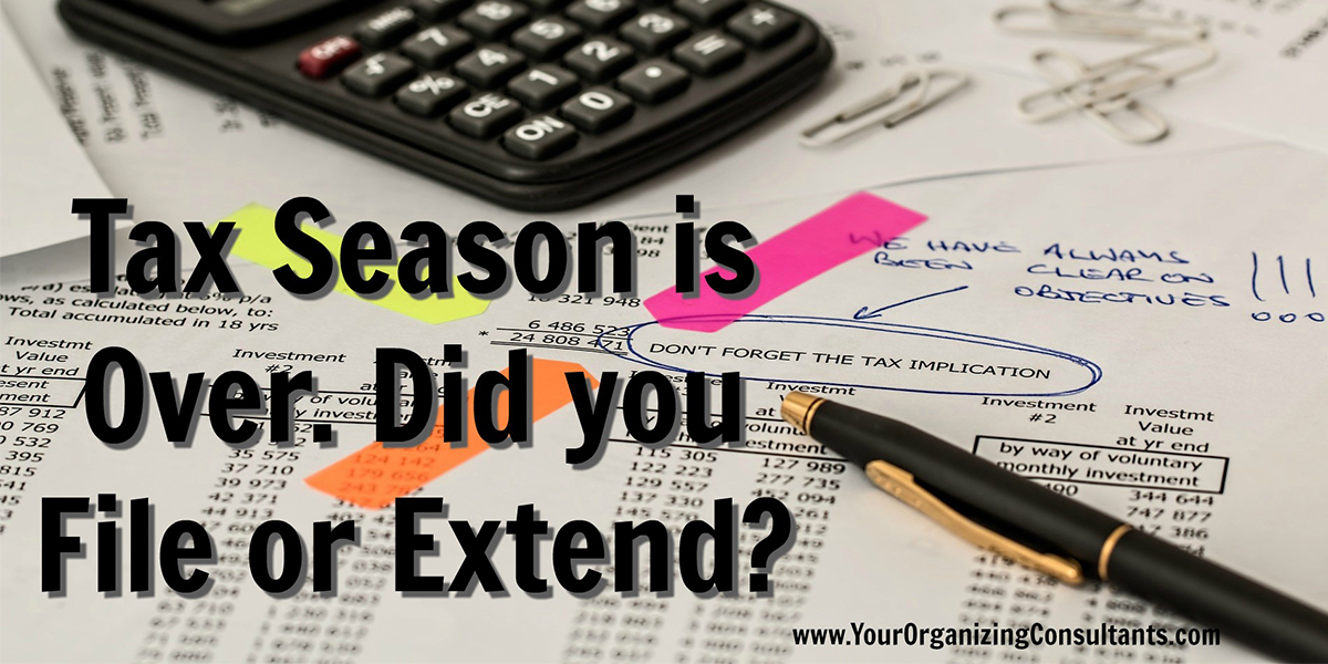 a financial document with writing on it, next to a pen and a calculator with text that reads, tax season is over. Did you file or extend?