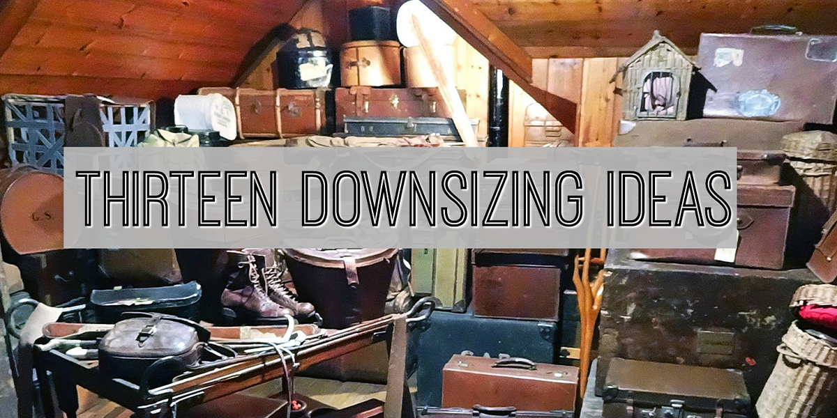 an attic filled with luggage, boxes and old items with text that reads thirteen downsizing ideas