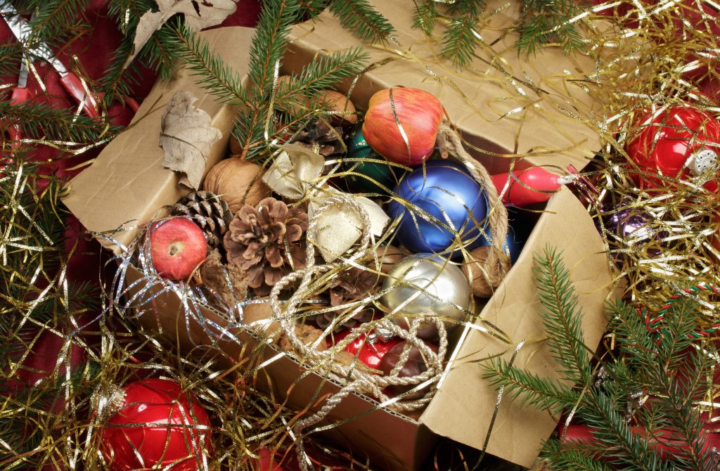de-clutter for the holidays  open box of holiday decorations 
